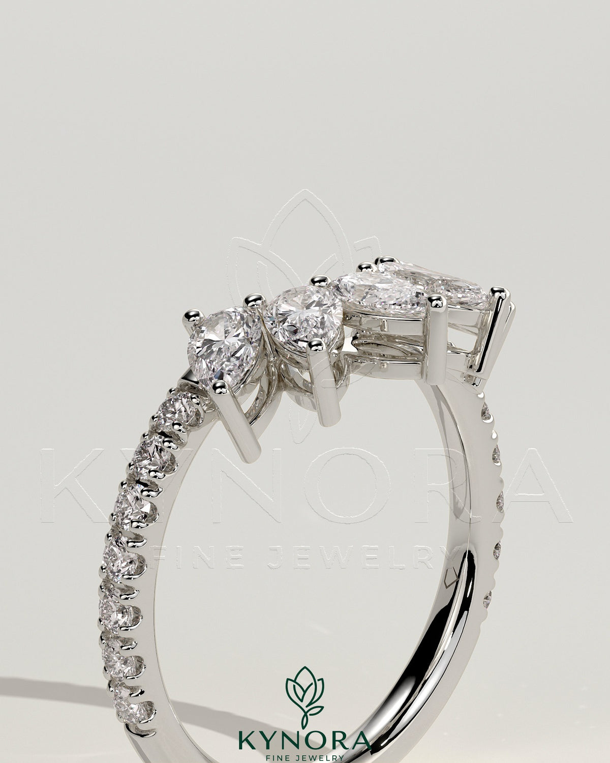 Kynora CJ accent stone wedding band with curved pave design, showcasing sparkling stones on a sleek gold wedding ring.