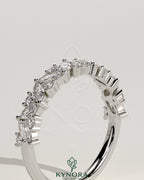 Kynora CJ wedding band with angled marquise and round accent stones, elegant gold wedding ring for special occasions.