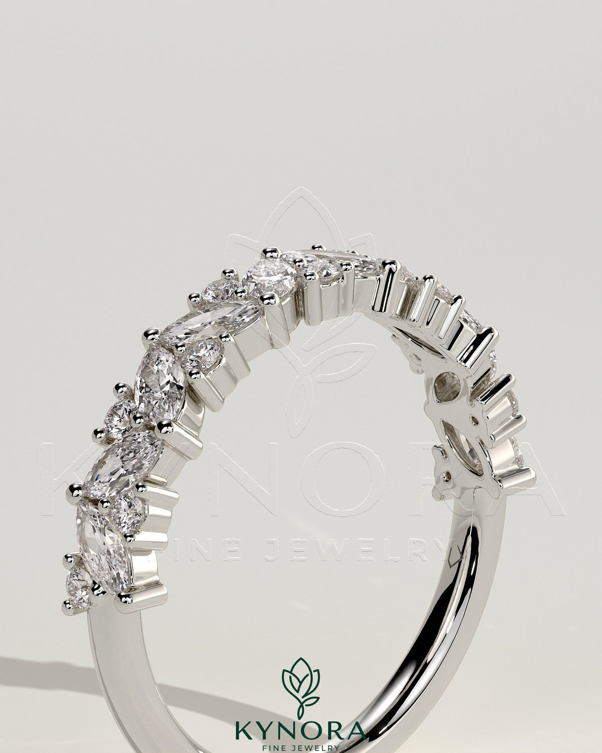 Kynora CJ wedding band with angled marquise and round accent stones, elegant gold wedding ring for special occasions.