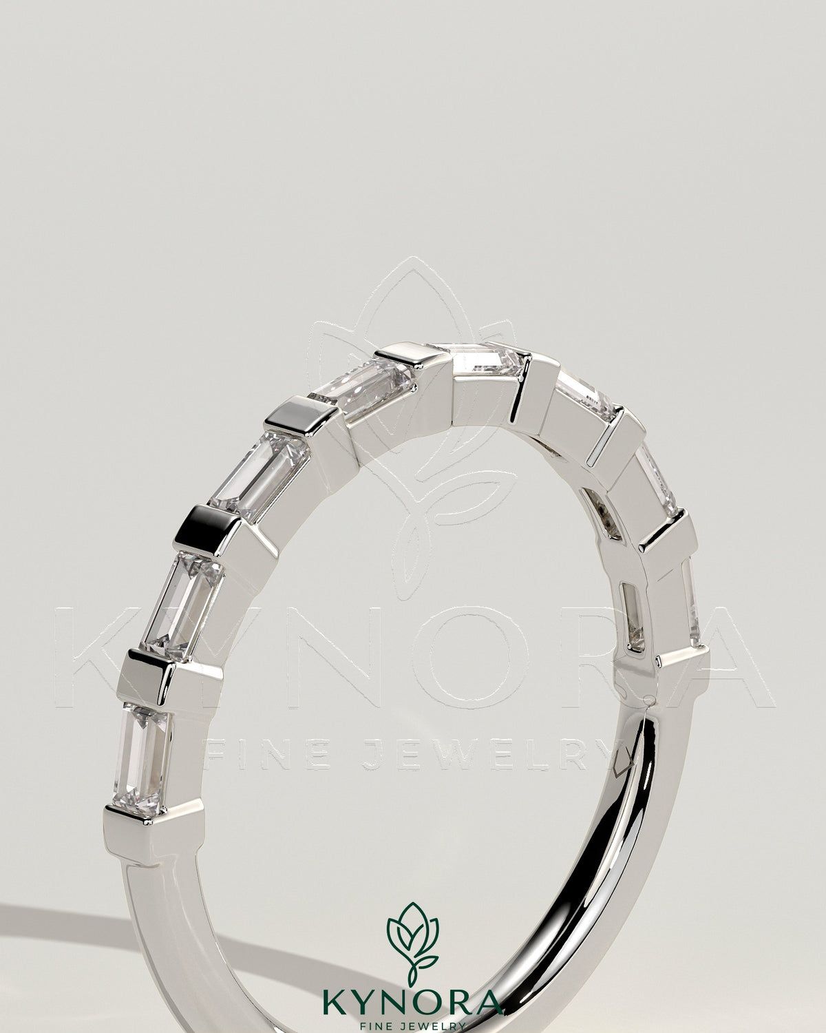 Kynora CJ wedding band with baguette spaced accent stones, elegant gold wedding ring for special occasions.