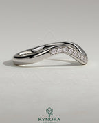Kynora CJ pave bead wedding band featuring a wave design, made with sparkling beads for an elegant, modern wedding ring.