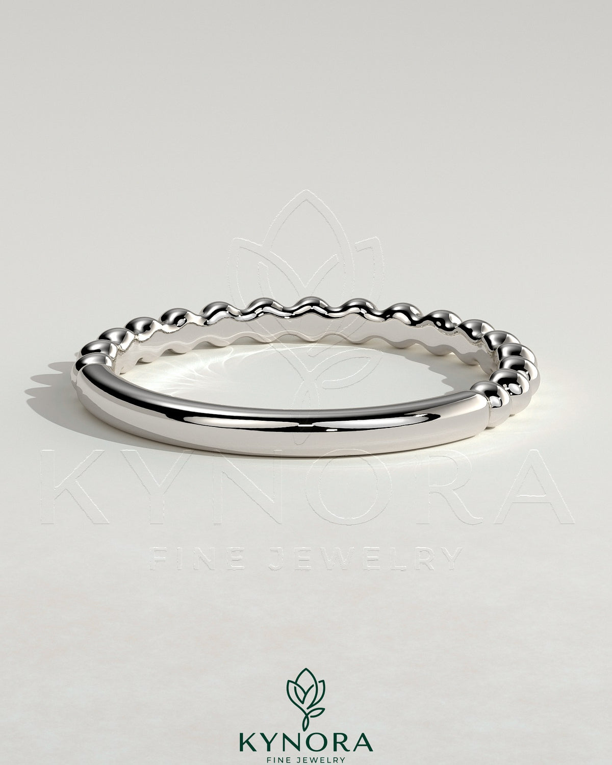 Kynora CJ beaded wedding band ring with intricate beaded detailing, designed for elegant wedding jewelry.