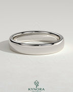 Kynora CJ wedding band with engraved cigar band design, crafted for elegant men's wedding jewelry, shown on a neutral background.