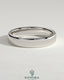 Kynora CJ wedding band with engraved cigar band design, crafted for elegant men's wedding jewelry, shown on a neutral background.