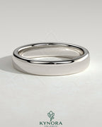 Kynora CJ wedding band with cigar-style design, crafted jewelry ring featuring a sleek, polished finish on a wedding ring.