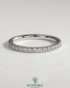 Kynora CJ Classic Full Pave Band Wedding Ring with sparkling pave diamonds, showcasing a sleek, elegant gold band design.