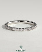Kynora CJ classic full pave band wedding ring with sparkling diamonds, showcasing a sleek and elegant design.