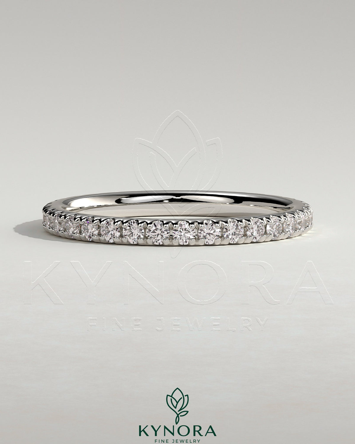 Kynora CJ classic full pave band wedding ring with sparkling diamond accents on polished gold band.