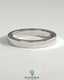 Kynora CJ classic hidden pave flat cigar band wedding ring with subtle sparkling accents on a gold band.