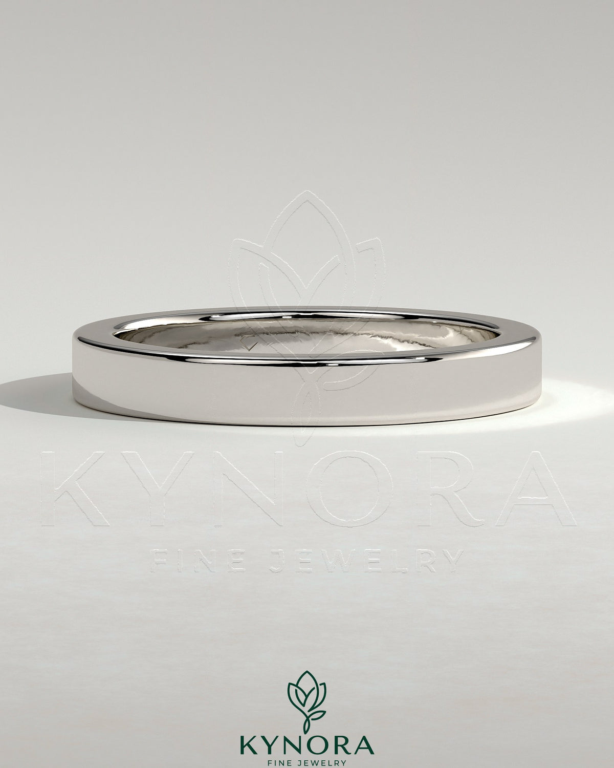 Kynora CJ classic hidden pave flat cigar band wedding ring with intricate diamond detailing on a silver band.
