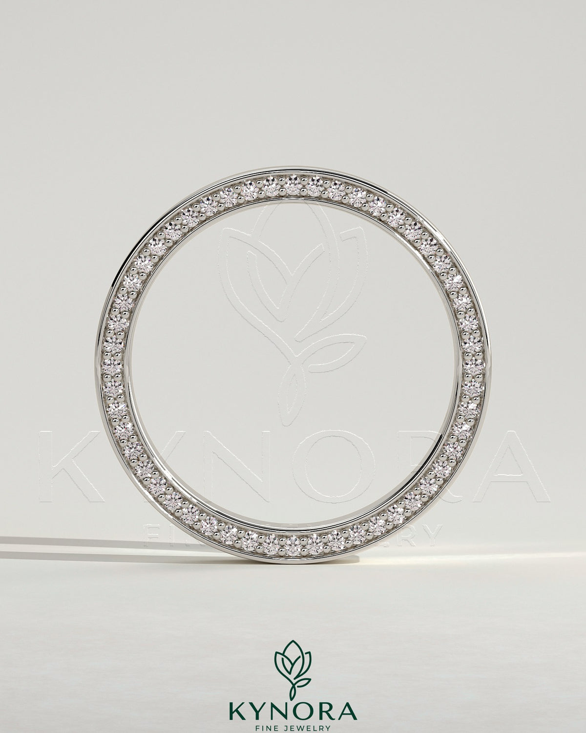 Kynora CJ Classic Hidden Pave Flat Cigar Band Wedding Ring with intricate pavé detailing on a sleek gold band