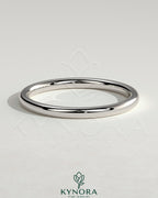 Kynora CJ classic plain wedding band ring with a smooth, polished gold finish, designed for elegant wedding jewelry.