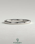 Plain wedding band ring from Kynora CJ with a classic design, showcasing a smooth, polished silver finish.