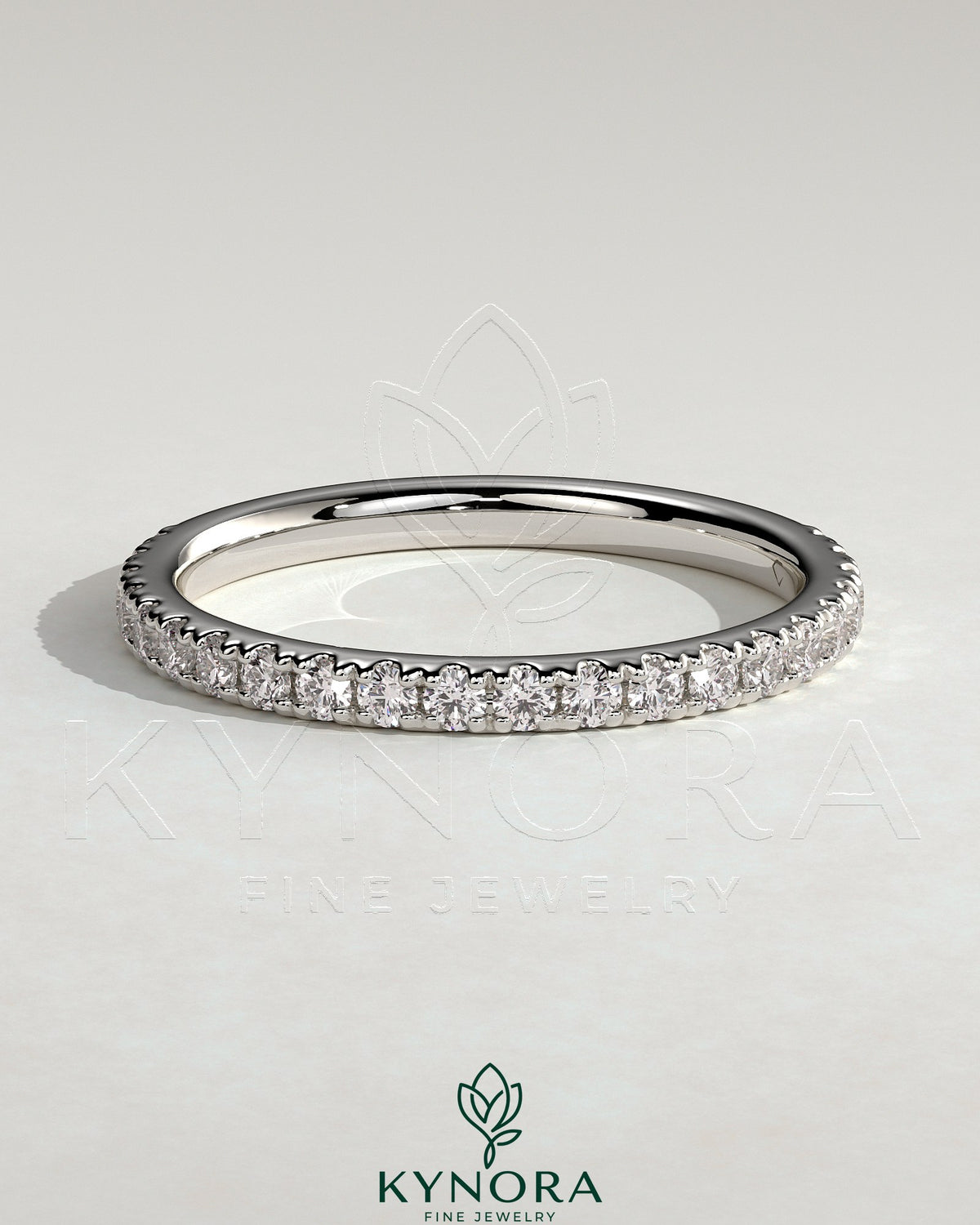 Kynora CJ classic two-third pave band wedding ring with sparkling diamonds, elegant and timeless jewelry for special occasions Imagen principal del producto