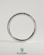Kynora CJ classic two-third pave band wedding ring with intricate diamond detailing and sleek gold band design.