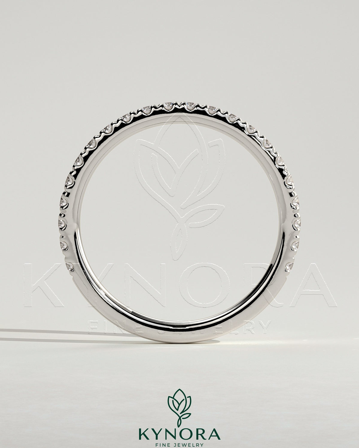 Kynora CJ classic two-third pave band wedding ring with intricate diamond detailing and sleek gold band design.
