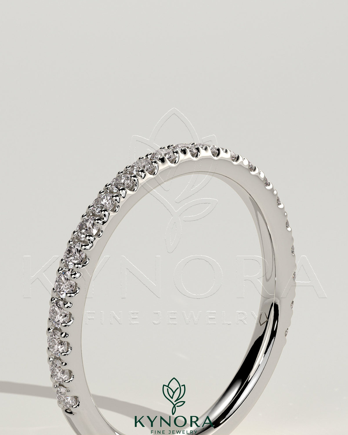 Kynora CJ classic two third pave band wedding ring with intricate diamond detailing on a gold band.
