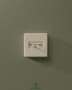 Deep V band wedding ring by Kynora CJ featuring a sleek, modern design in polished metal.