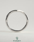 Kynora CJ deep V band wedding ring showcasing a sleek, elegant design in polished metal for special occasions and vows.