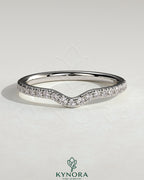 Demi two-third curved pave diamond wedding band by Kynora CJ, featuring intricate pave setting and elegant curved design.
