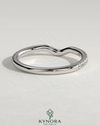 Kynora CJ Demi Two Thirds Curved Pave Band wedding ring showcasing a delicate, curved design with pavé setting of small sparkling stones.