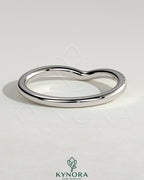 Kynora CJ dipped half pave curved wedding band with small sparkling stones, elegant and stylish jewelry for special occasions.