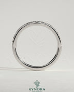 Kynora CJ dipped half pave curved wedding band with sparkling pave stones and sleek gold finish, elegant jewelry for special occasions