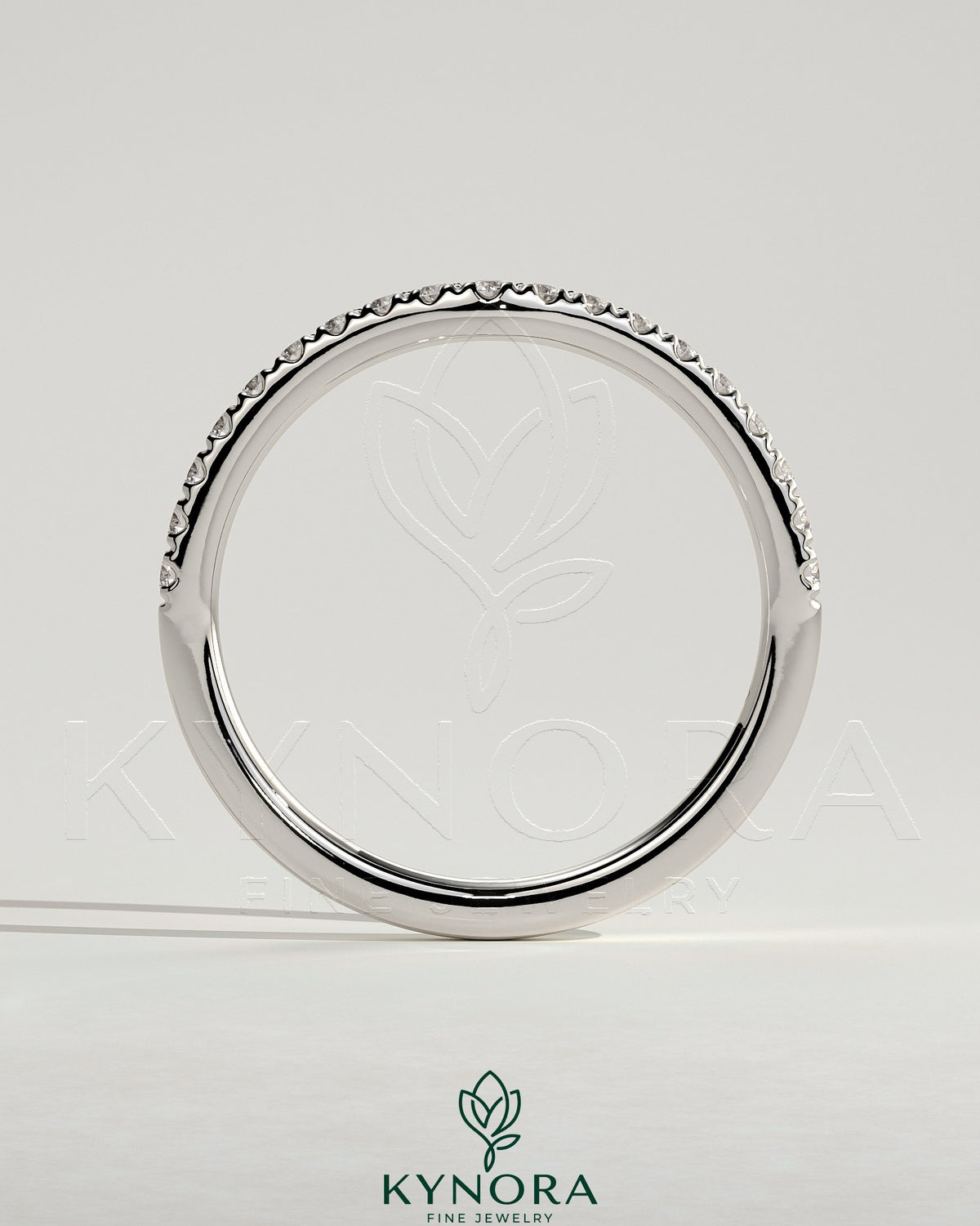 Kynora CJ dipped half pave curved wedding band with sparkling pave stones and sleek gold finish, elegant jewelry for special occasions
