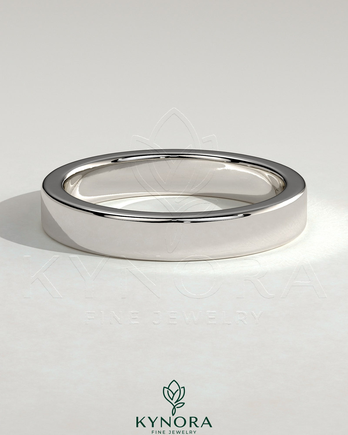 Kynora CJ flat cigar band wedding ring in polished gold, showcasing a sleek, wide design suitable for wedding jewelry. Imagen principal del producto
