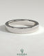 Kynora CJ flat cigar band wedding ring in polished gold, showcasing a sleek, wide design suitable for wedding jewelry.
