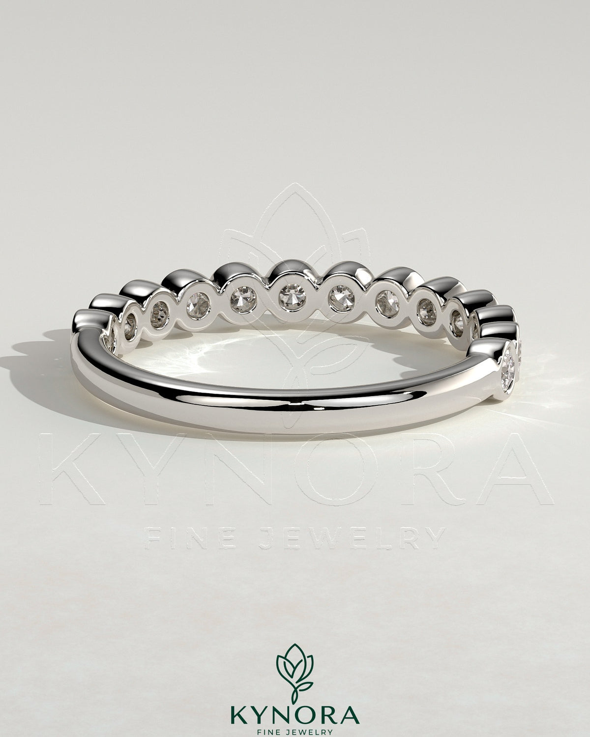 Kynora CJ Half Eternity round bezel set wedding band with sparkling diamonds, elegant gold wedding ring for special occasions