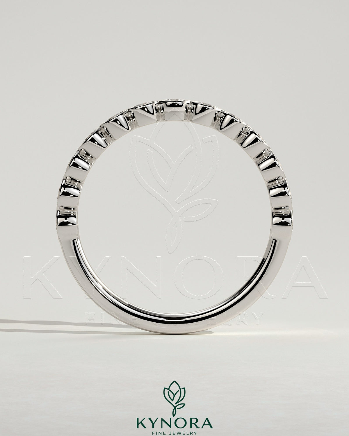 Kynora CJ half eternity round bezel set wedding ring with sparkling gemstones, elegant wedding band for special occasions.