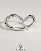 Kynora CJ half pave deep V band wedding ring with small sparkling stones, crafted in elegant gold for a stylish bridal accessory.