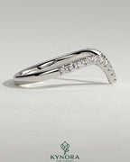 Kynora CJ half pave deep V band wedding ring with sparkling small diamonds and sleek gold finish.
