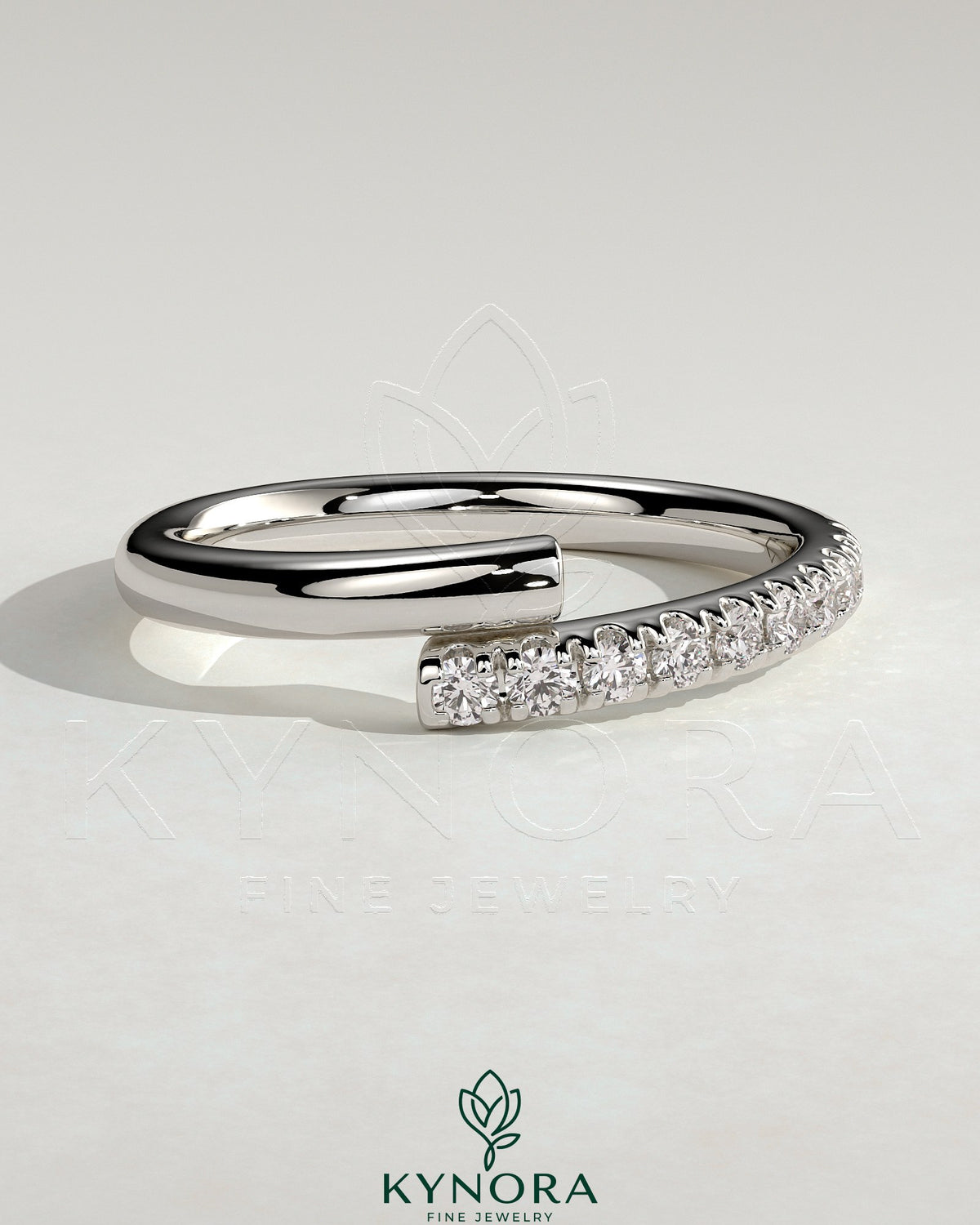 Kynora CJ half pave wrap band wedding ring with sparkling pave setting, elegant gold finish, and sleek, modern design.