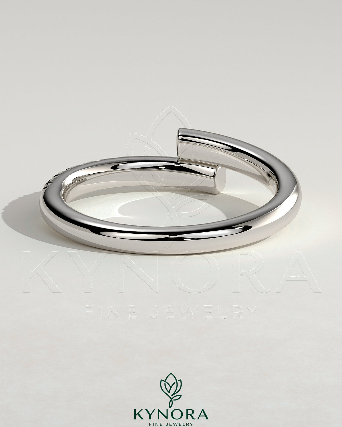 Kynora CJ half pave wrap wedding band ring with intricate diamond detailing and sleek gold finish.
