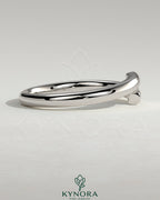 Kynora CJ half pave wrap wedding band with small sparkling diamonds, elegant and sleek design for special occasions.