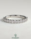 Kynora CJ half round eternity wedding band with scalloped setting, showcasing a sleek, polished gold finish and intricate design details.