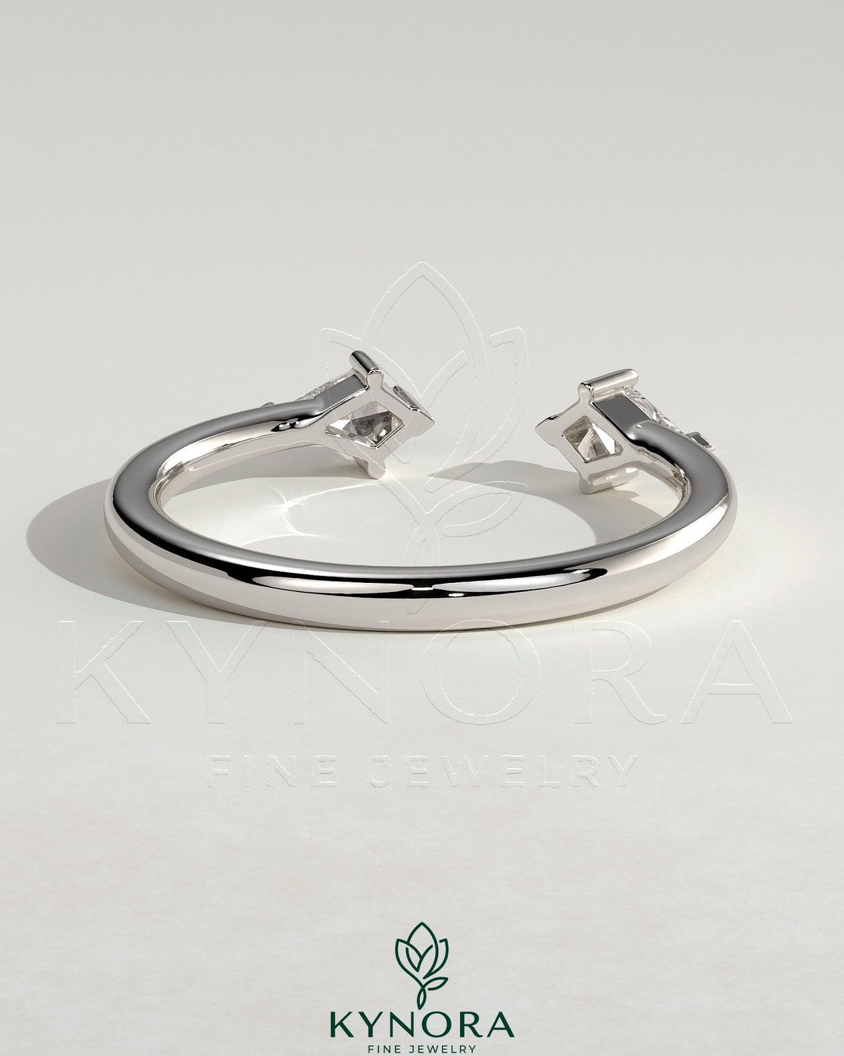 Kynora CJ Kite Accent Stone open band wedding ring with sparkling gemstones on a silver band, elegant wedding jewelry piece