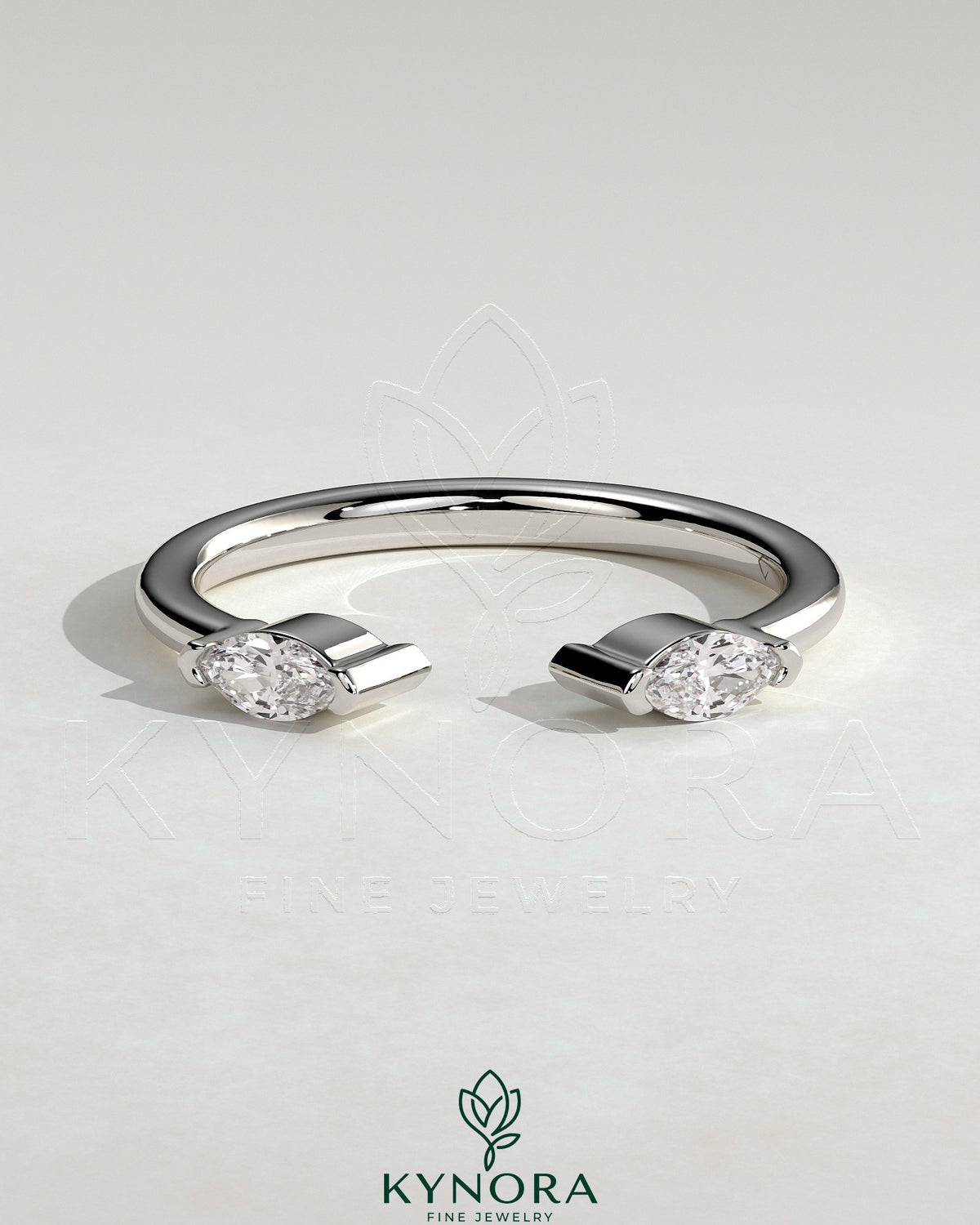 Kynora CJ Marquise accent stone open band wedding ring with elegant design and sparkling marquise-shaped stones. Imagen principal del producto