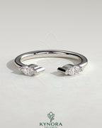 Kynora CJ Marquise accent stone open band wedding ring with elegant design and sparkling marquise-shaped stones.
