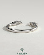 Kynora CJ Marquise Accent Stone open band wedding ring with marquise-shaped stones on a sleek gold band for elegant bridal jewelry.