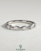 Kynora CJ Marquise Accent Stone Wedding Ring featuring marquise-shaped stones on a sleek wedding band design.