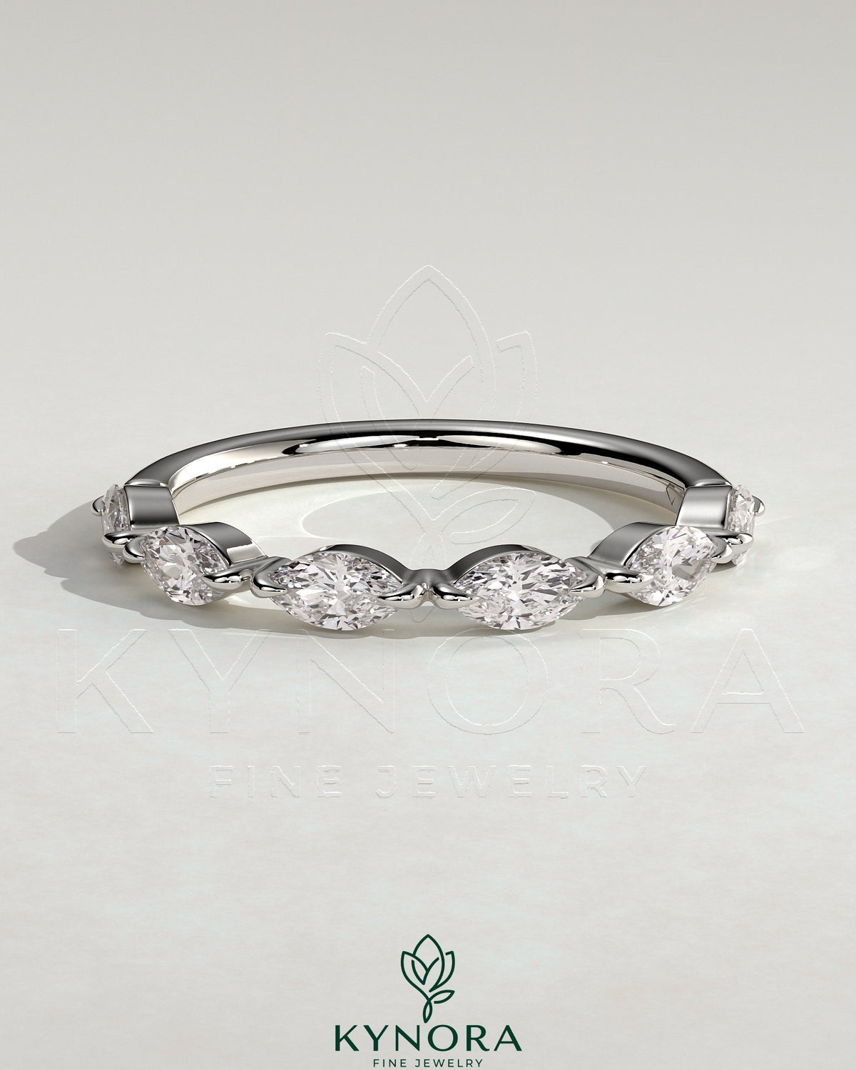 Kynora CJ Marquise Accent Stone Wedding Ring featuring marquise-shaped stones on a sleek wedding band design.