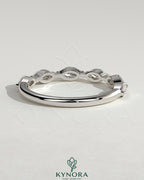 Kynora CJ Marquise Accent Stone Wedding Band featuring marquise-shaped accents and sparkling stones on a sleek gold wedding ring