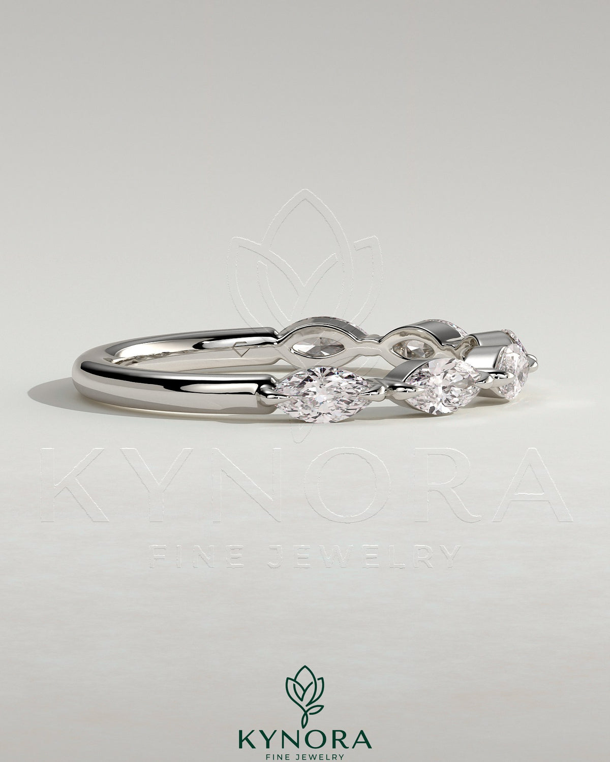 Kynora CJ Marquise Accent Stone Wedding Ring, elegant gold wedding band with marquise-shaped accent stones, fine craftsmanship.