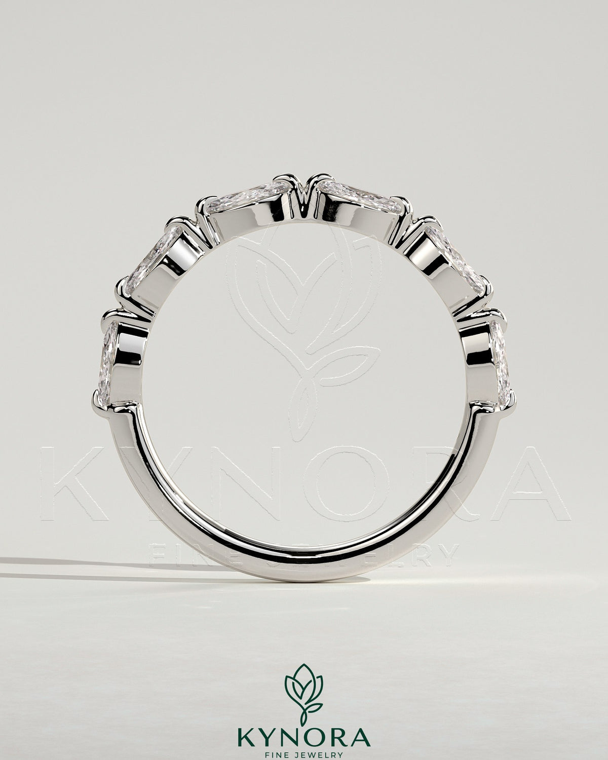 Kynora CJ Marquise Accent Stone wedding band featuring marquise-shaped diamonds and a sleek gold finish.
