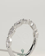 Kynora CJ Marquise Accent Stone Wedding Ring featuring a sleek band with marquise-shaped accent stones for elegant bridal jewelry