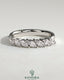 Kynora CJ Marquise East West Accent Stone wedding band with closed basket setting, elegant gold wedding ring with marquise stones.