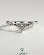 Kynora CJ wedding band featuring marquise and round accent stones with a vine design, crafted for elegant wedding jewelry.